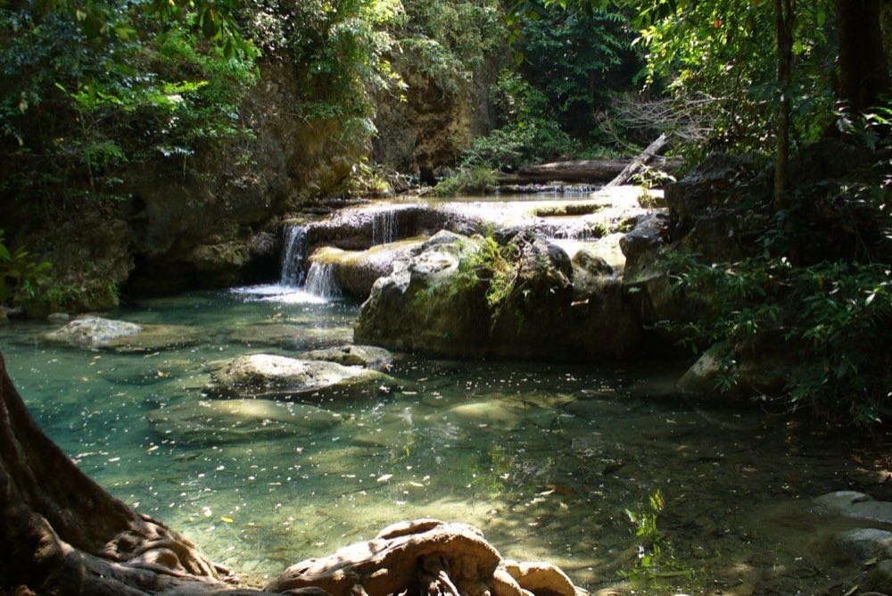 Turquoise tier of Erawan Falls with limestone pools