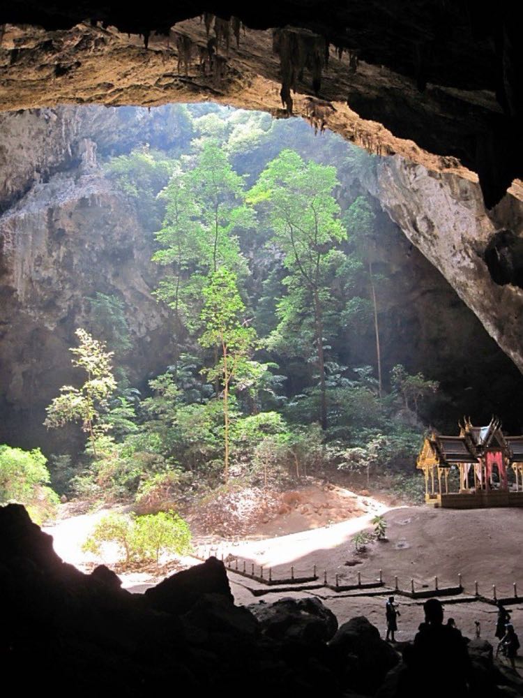 The Kuha Karuhas royal pavilion lit by a sunbeam inside Phraya Nakhon Cave